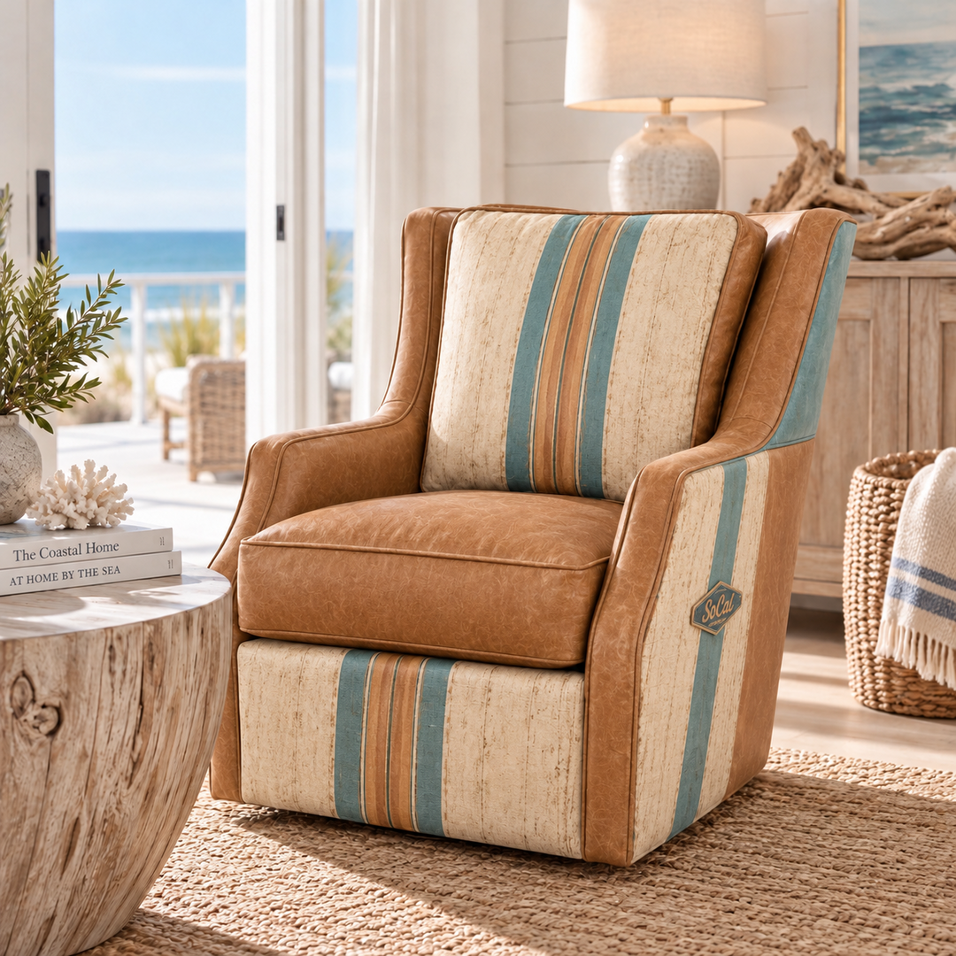 Solana chair in warm saddle tones with cream and sea-blue striped panels, styled in a bright coastal room.
